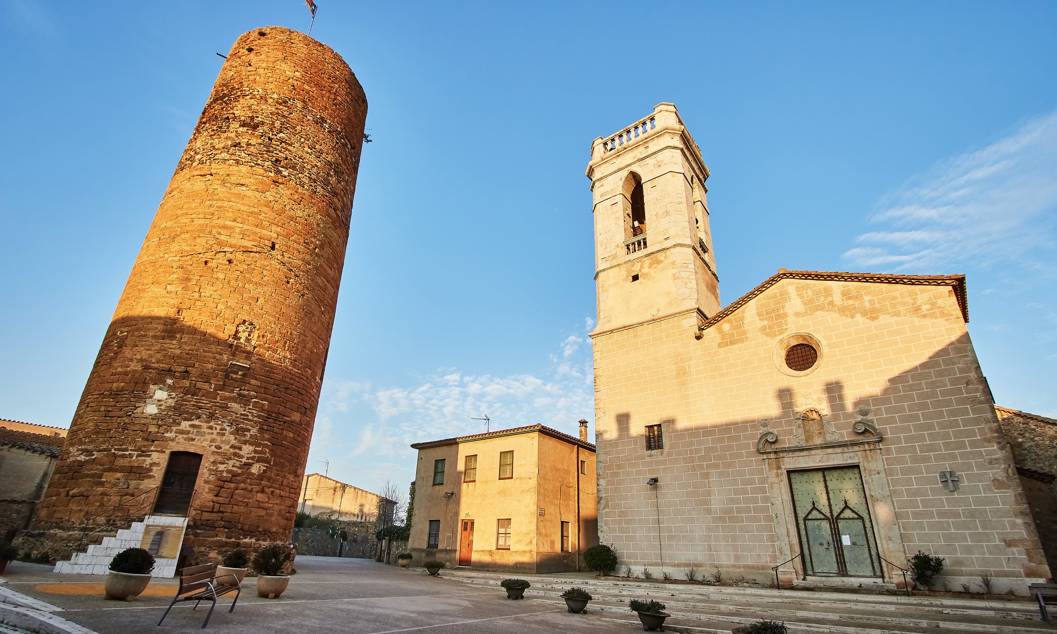 A view of the church tower and the castle tower in the village