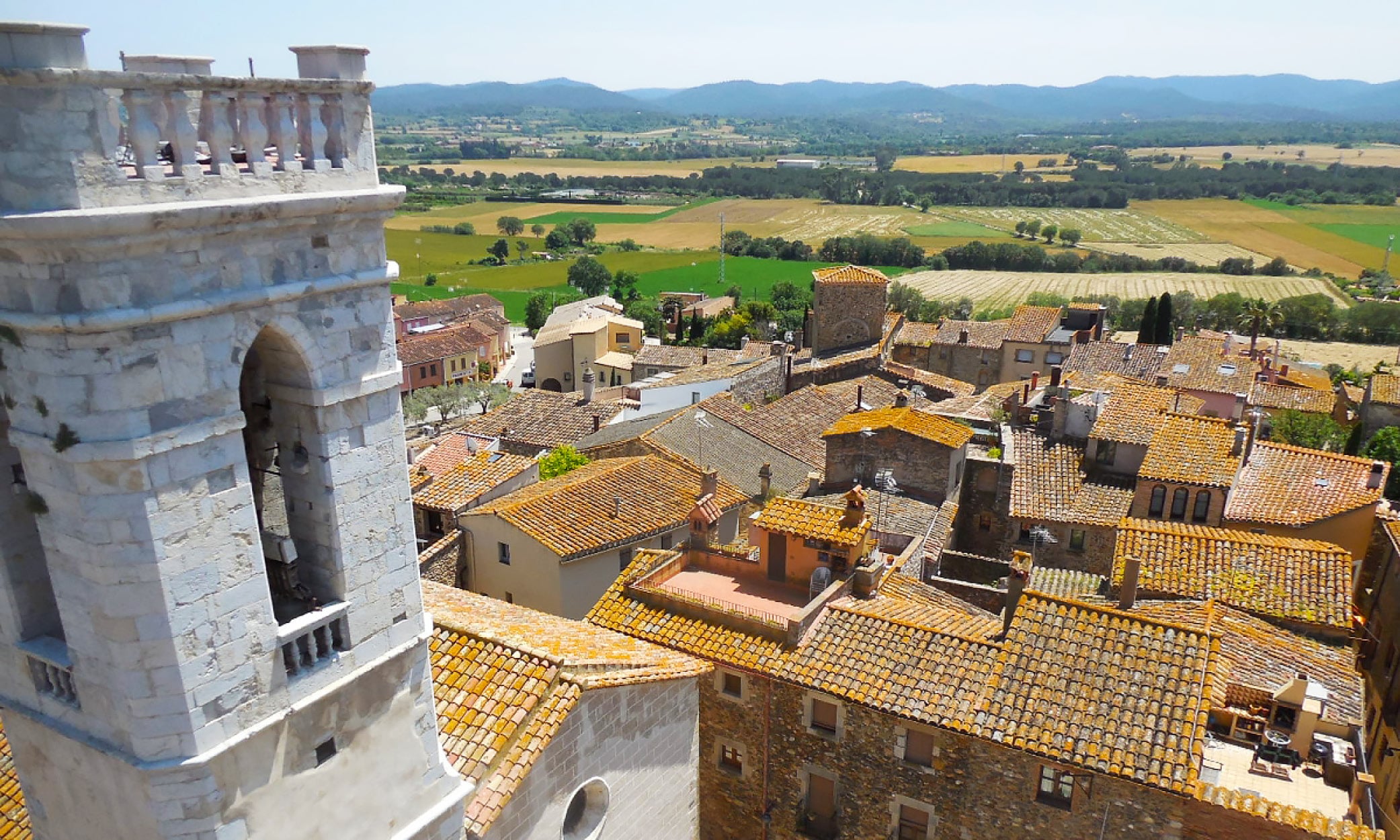 A view of the church tower from the castle tower in Cruïlles