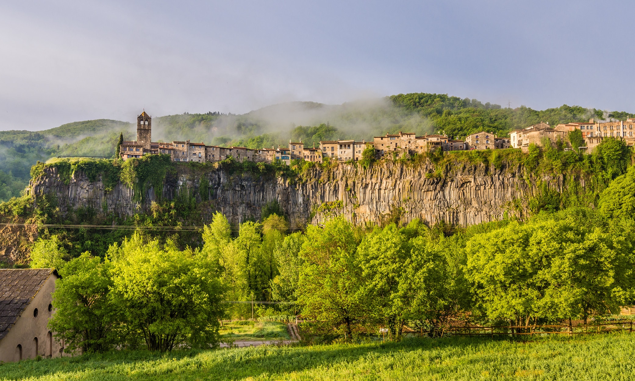 The church of Castellfollit de la Roca, perched on top of a 50m basalt cliff