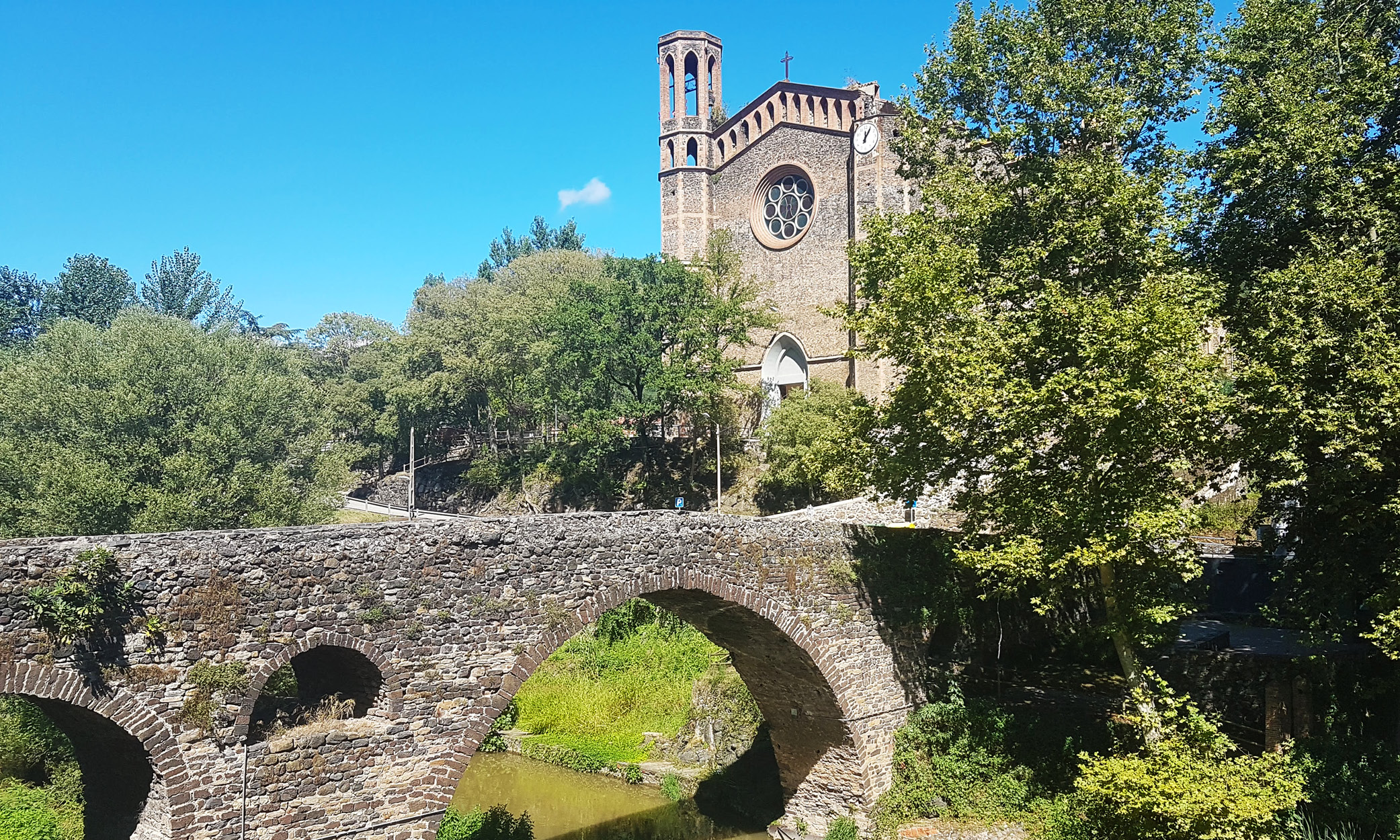 The bridge leading to the church of St Joan les Fonts from the 19th century