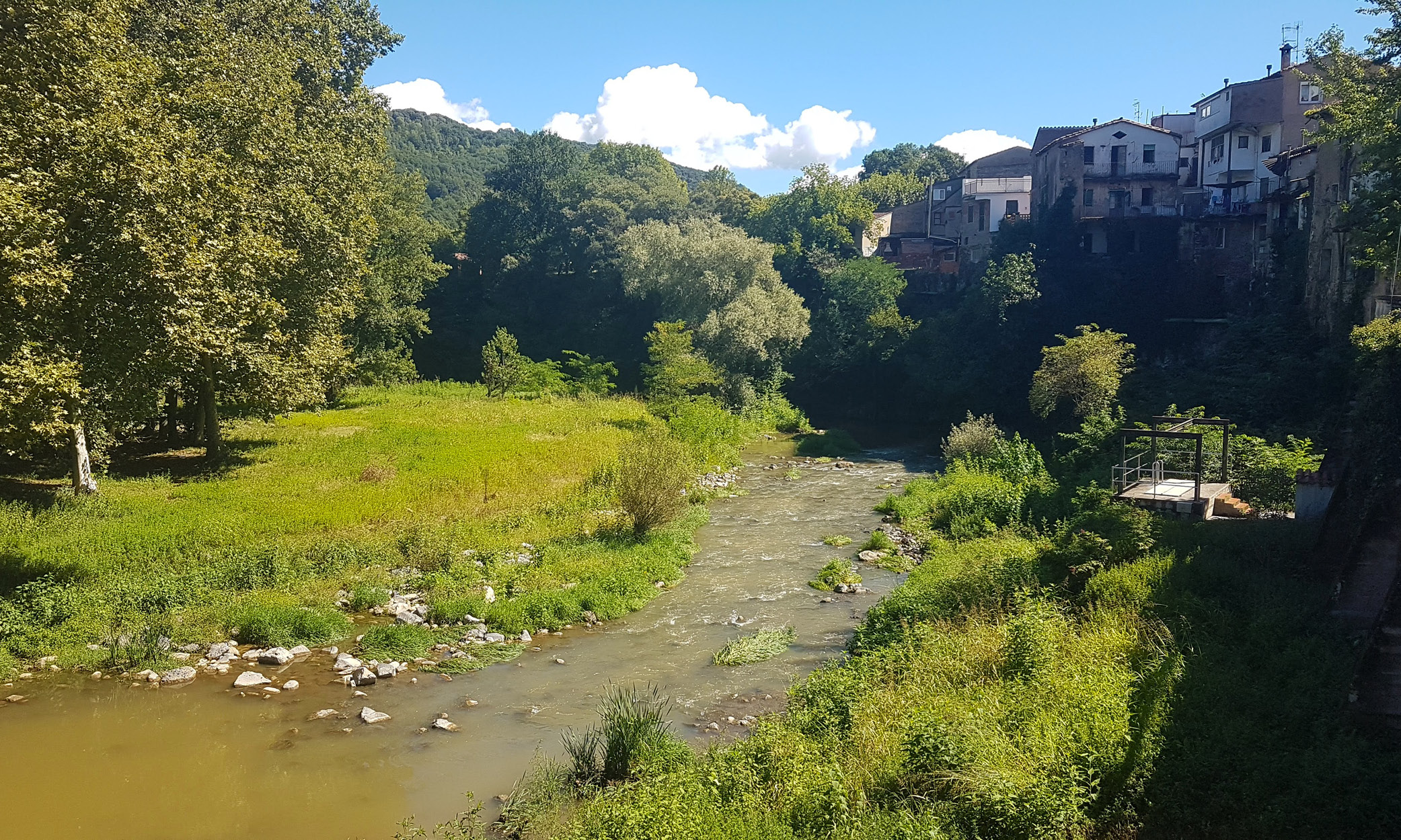 A stream flowing by the village of St Joan les Fonts