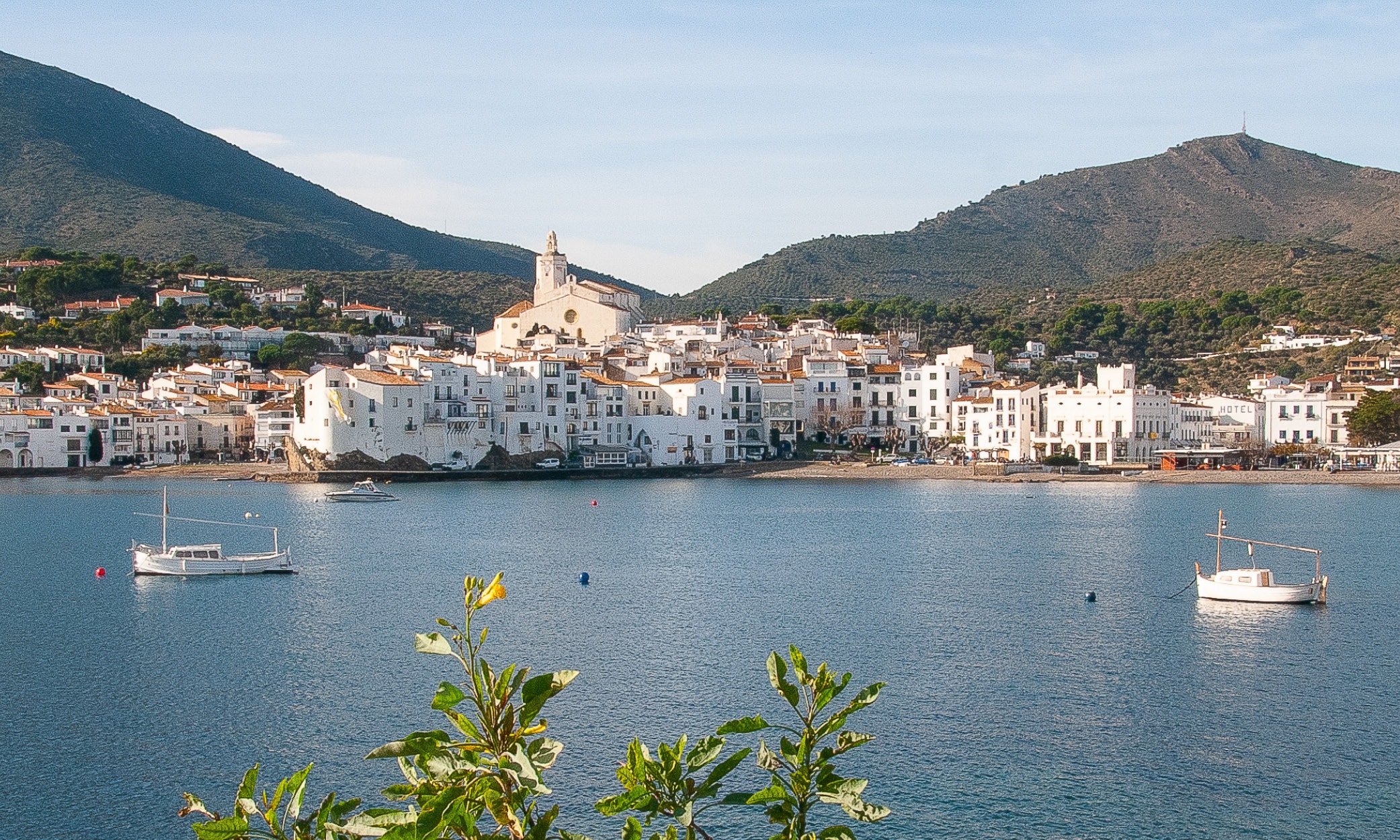 njoy costa brava cadaques dali light Cadaqués with white façades and calm blue water in the morning light that inspired Dalí.