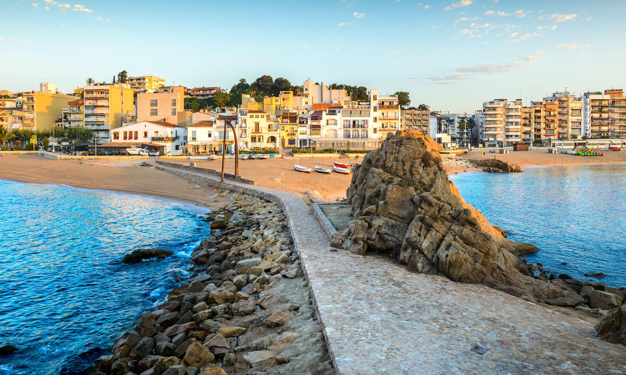 Early morning view of Blanes and its main beach, seen from Sa Palomera Rock on La Costa Brava.