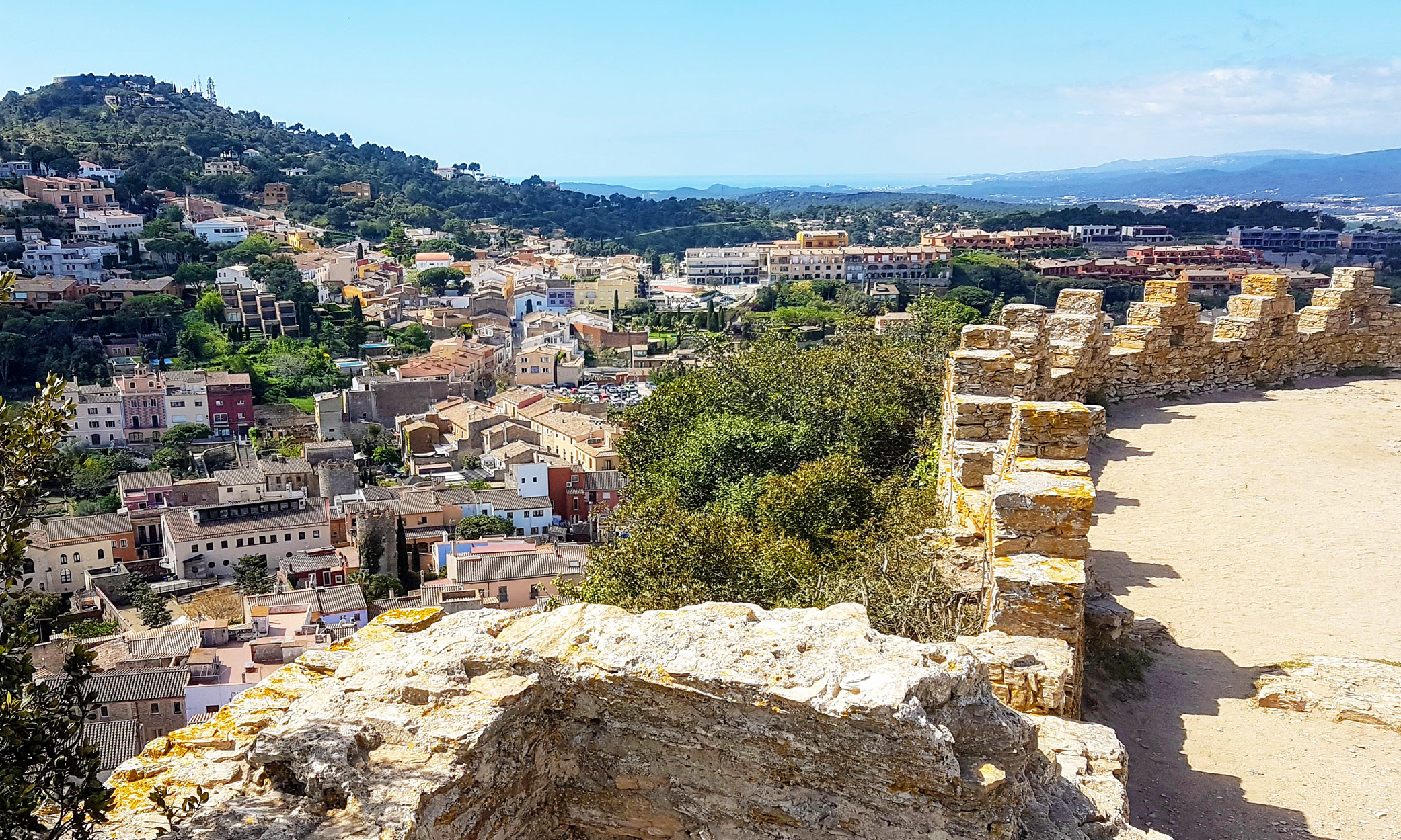 View over Begur’s old town and surrounding landscape from the ruins of Begur Castle on La Costa Brava.