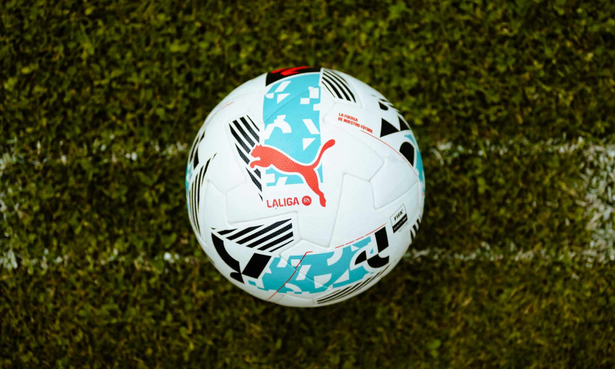 The official Puma EA Sports LaLiga Orbita match ball with red, black, and teal design.